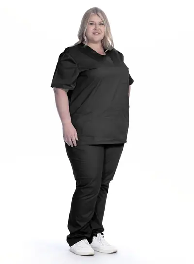 GreenTown Classix 2005 unisex scrub pants in Black, full-length view on model