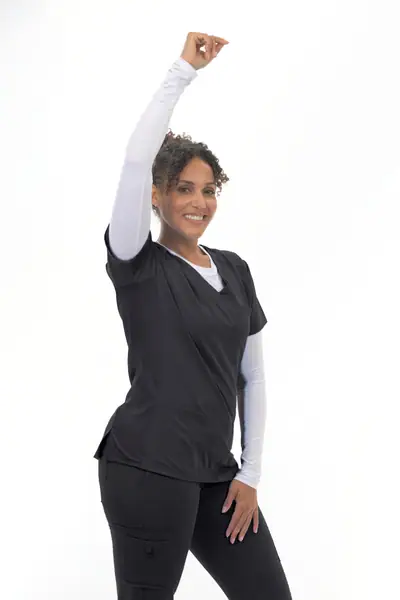 3602 Flaunt Flexi Pro Stretch V-Neck Scrub Top in Black, worn with arm raised